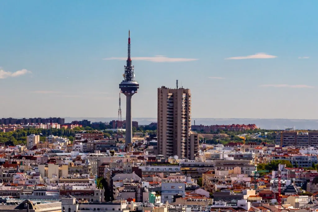 Madrid, Spain- October 5, 2021: Panoramic view of the Spanish television tower called "El pirulí" in Madrid. Communication tower. Madrid Skyline.